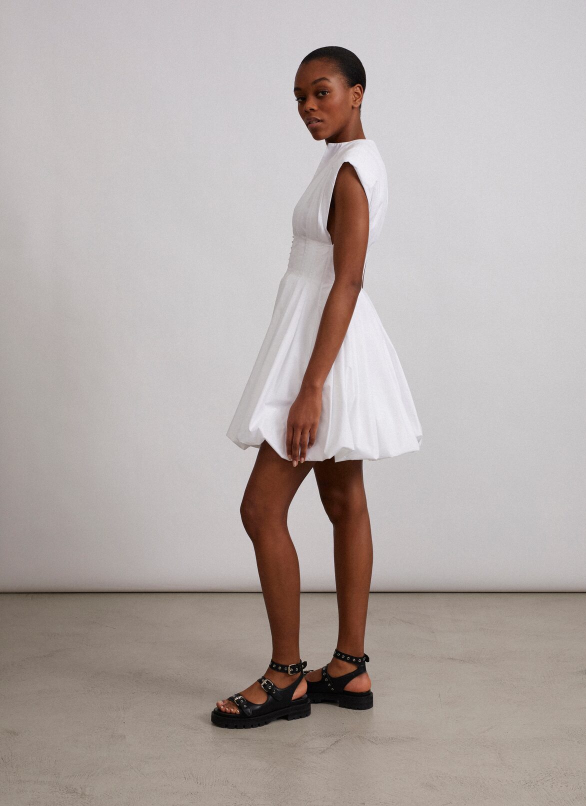 Cotton poplin corset dress
 ALAÏA WHITE COTTON POPLIN CORSET DRESS